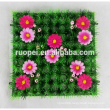 Showcase decorative artificial green mat with flowers foliage